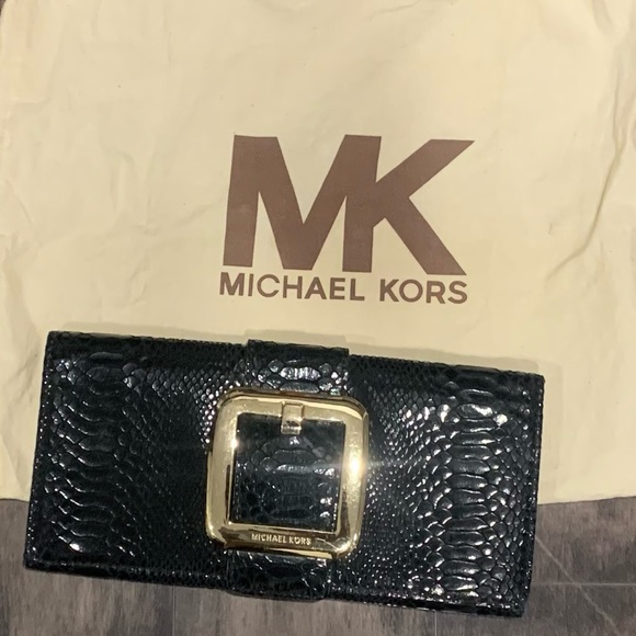 Authentic Michael Kors Clutch in mint condition - Picture 3 of 8